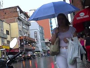 Phat booty in white pants caught on rainy day Picture 2