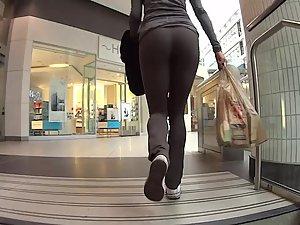 Athletic ass in front of me on moving stairs Picture 3