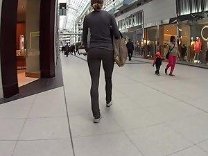 Athletic ass in front of me on moving stairs Picture 4