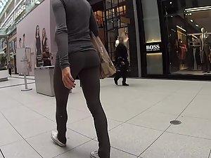Athletic ass in front of me on moving stairs Picture 6