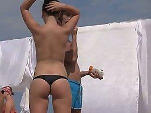 Cute teenage butt in a thong bikini Picture 1