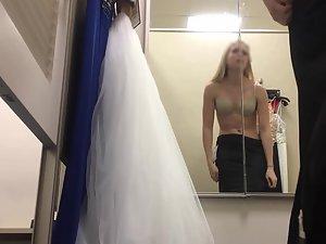 Spying on gorgeous young blonde in dressing room Picture 5