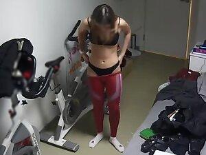 Spying on hot girl putting on fitness outfit