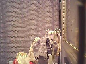 Hidden cam patiently waits to see her naked under shower curtain Picture 2