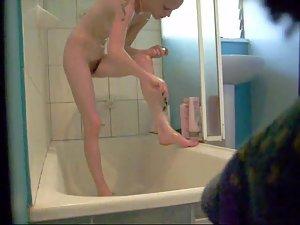 Skinny girl showers and gets peeped Picture 3