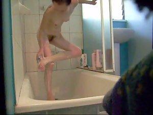 Skinny girl showers and gets peeped Picture 5