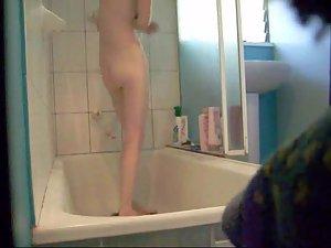 Skinny girl showers and gets peeped Picture 6