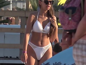 Amazing bubble butt and wide hips in white bikini