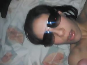 Girl in glasses gets cum in her mouth Picture 3