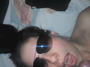 Girl in glasses gets cum in her mouth Picture 8
