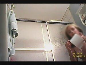 Teenage beauty showers and pisses Picture 3