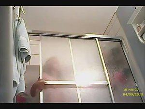 Teenage beauty showers and pisses Picture 5