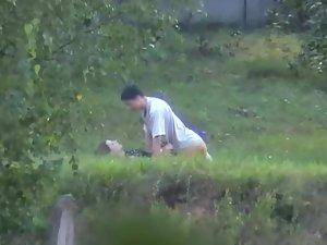 Teens fucking like rabbits in the grass Picture 4