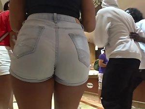 Cameltoe in too tight shorts is seen from behind back Picture 6