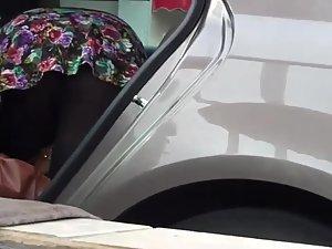 Butt covered with pantyhose in a car Picture 4