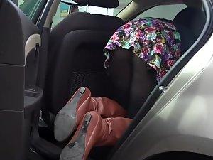 Butt covered with pantyhose in a car Picture 7