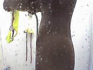 Dark tanned girl spied without a bikini Picture 1