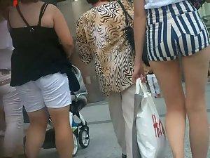 Tall sexy daughter shopping with mother Picture 1