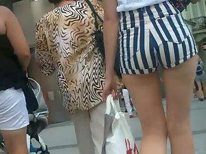 Tall sexy daughter shopping with mother
