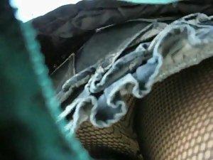 Fishnet stockings seen in an upskirt Picture 7
