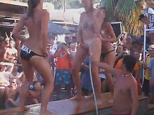 Teen girls get naked on a beach party Picture 2