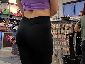 Fit girl in gym outfit is shopping for clothes Picture 5