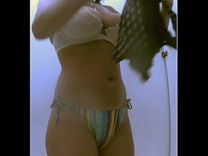 Hot woman undressing her pretty bikini Picture 5