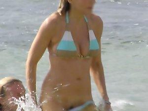 Friend pulls hot girl's bikini down Picture 1