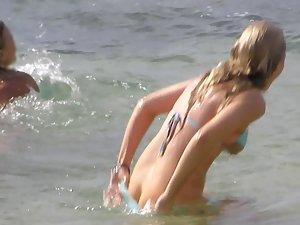 Friend pulls hot girl's bikini down Picture 5