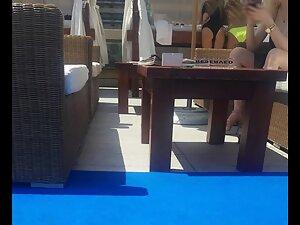 Hot ass in a swimsuit at a beach bar Picture 1