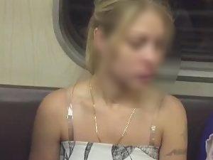 Teen blonde upskirted in train