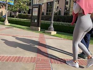 Voyeur follows a fit bubble butt in tight grey leggings Picture 5