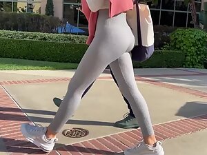 Voyeur follows a fit bubble butt in tight grey leggings