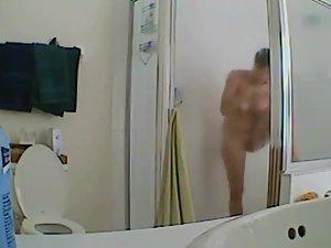 Sexy naked girl spied under a shower Picture 2