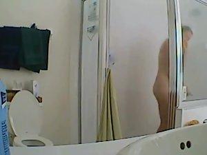 Sexy naked girl spied under a shower Picture 4