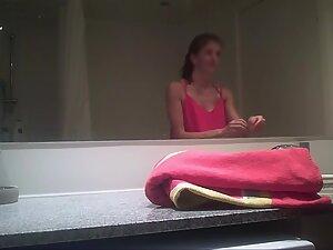 Small tits caught by hidden camera in bathroom Picture 1