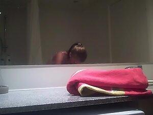 Small tits caught by hidden camera in bathroom Picture 3