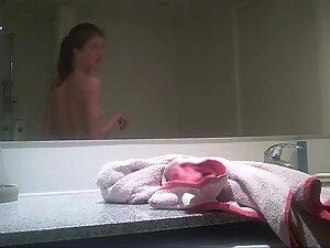 Small tits caught by hidden camera in bathroom Picture 8