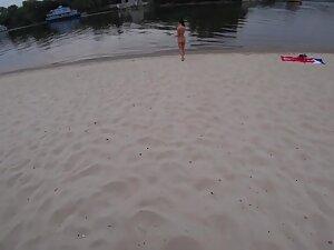 Stunning girl shows off naked body during beach massage Picture 8