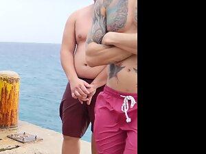 Cameltoe and plump butt spotted during rainy day at the beach Picture 6