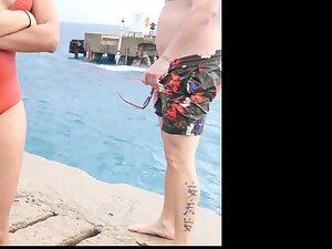 Cameltoe and plump butt spotted during rainy day at the beach Picture 8