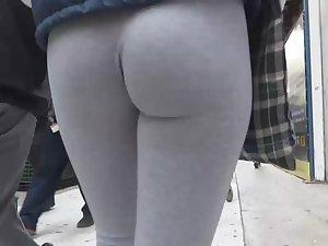 Voyeur follows hot ass in tights Picture 6