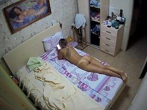 Spying on naked cousin chilling in her room Picture 1