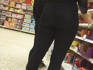 Milf bends over in toy store Picture 1