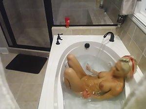 Horny girl spied in soapy bath Picture 2