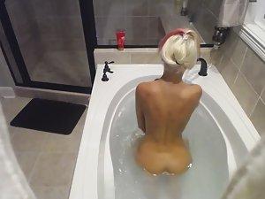 Horny girl spied in soapy bath Picture 4