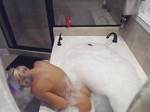 Horny girl spied in soapy bath Picture 8