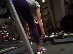 Spying while a sexy girl does deadlifts