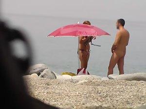 Chubby girl undresses at the beach Picture 8