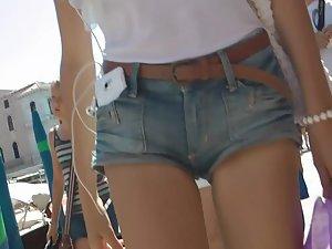 Innocent looking girl in tiny shorts